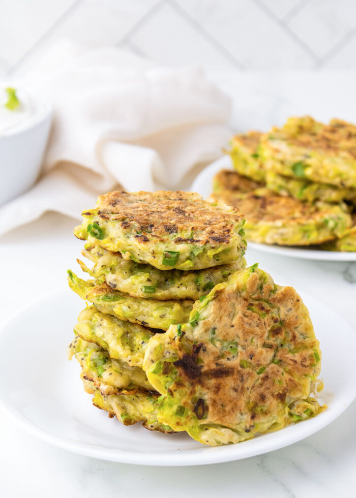 Pile of zucchini fritters on a plate